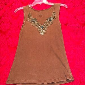 Stunning, turquoise and coral beads accent is beautiful tank top.